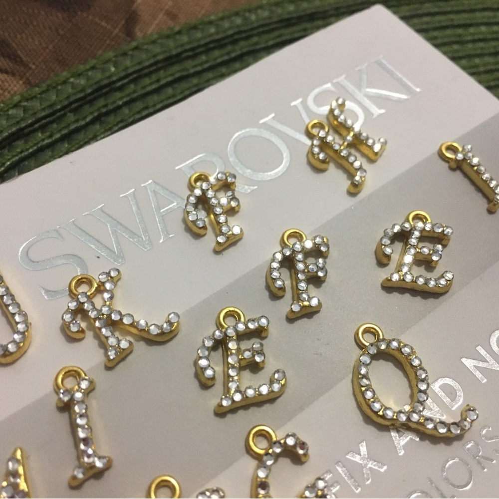 Swarovski crystal gold plated letter “A” charm